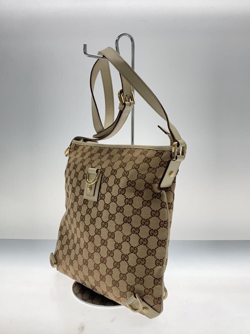 Gucci GG Beige Canvas Shoulder Bag over Abby All Tan